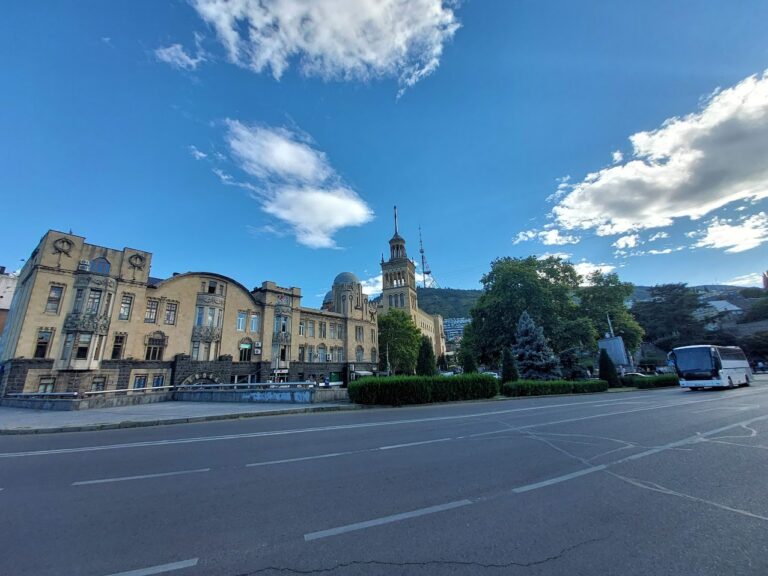 Historic building with Mtatsminda TV tower in the background, Tbilisi, Georgia